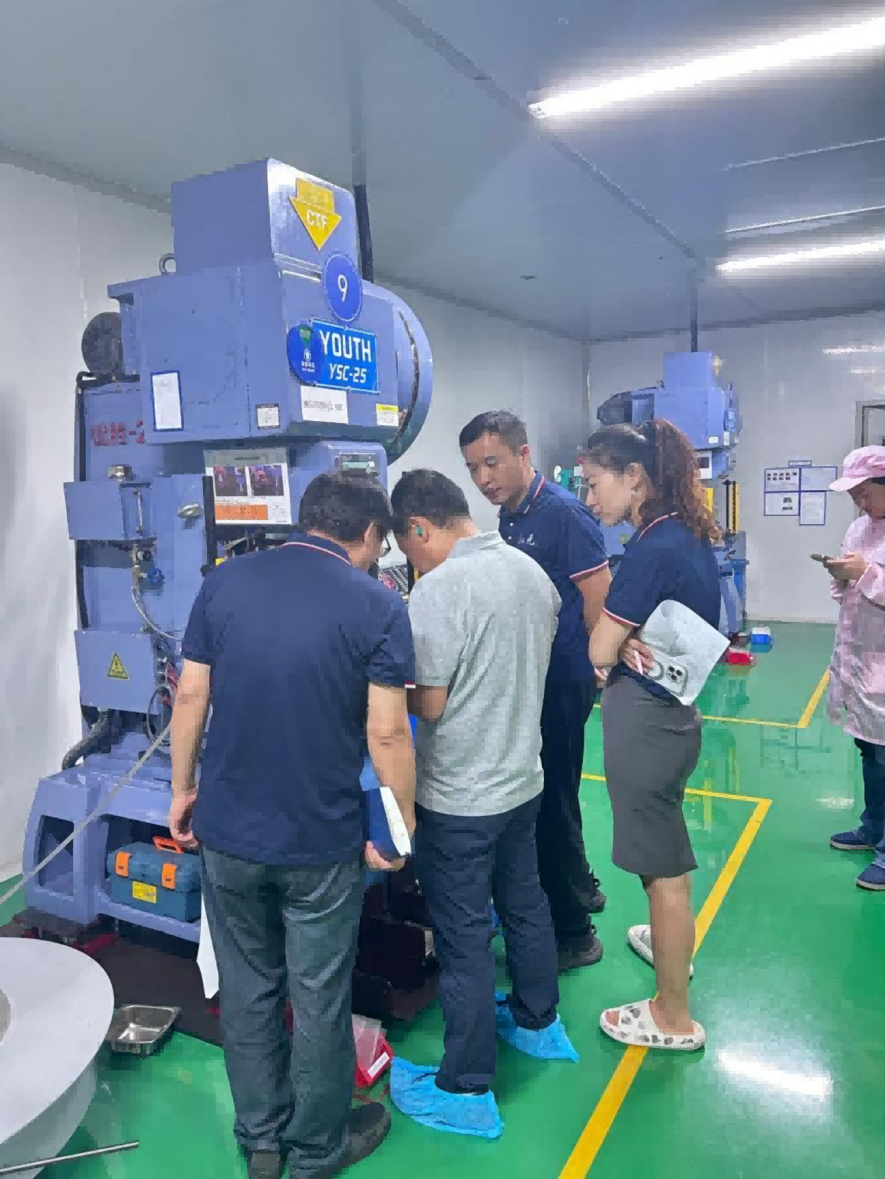 Reviewing production equipment during the on-site pre-audit