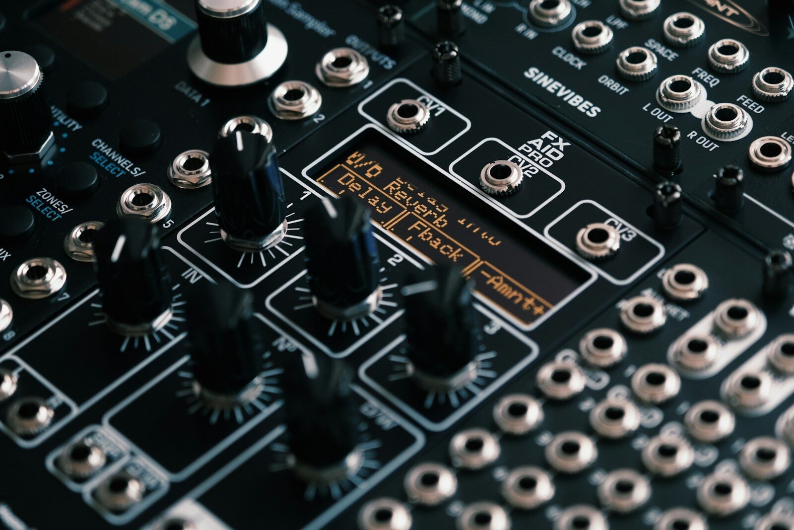 Close-up of a complex electronic music synthesizer panel